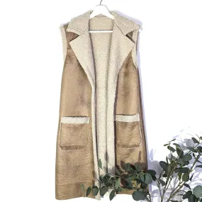 Mid length sheep skin style gilet with lapels and patch pockets